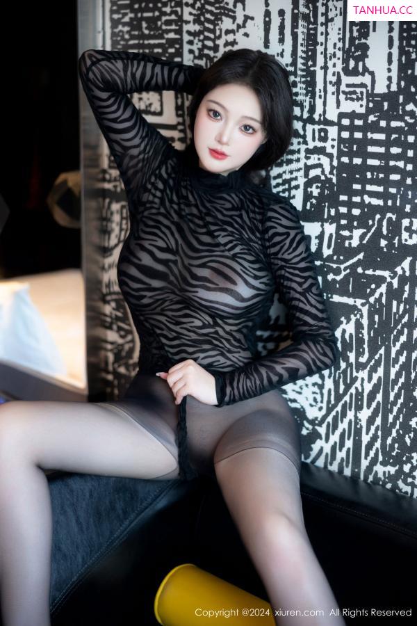   [XiuRen]高清写真图 2024.07.29 No.8929 潘多拉哦 黑丝美腿第36张图片